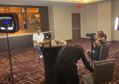 Simeon Fowler being filmed and interviewed at the 2025 Grassroots Conference