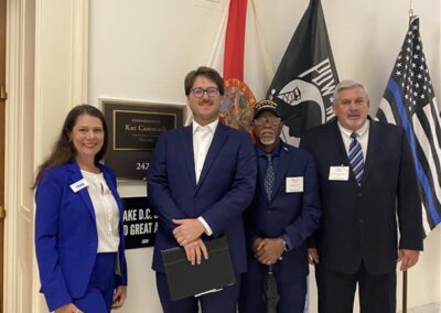 Matthew McCulloh, with BAC's, Susan McGrath, Simeon Fowler and John Saddler standing outside Congresswoman Cammack's office