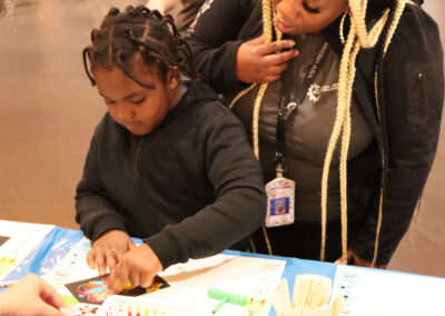 Children making scratchboard art at BACs Arts Festival