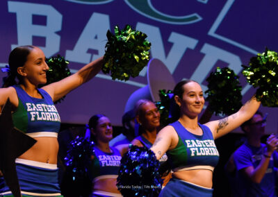 Closeup image of the Eastern Florida State Cheerleaders and Band on stage for the pre-show of the BAC 12th Annual Performing Arts Showcase at the King Center in Melbourne.