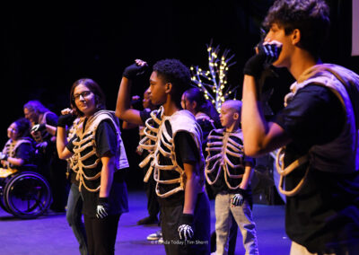 John F. Kennedy Middle School students performing in skeleton costumes at the BAC 12th Annual Performing Arts Showcase at the King Center in Melbourne.