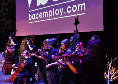 High school Orchestra musicians performing at the BAC 12th Annual Performing Arts Showcase at the King Center in Melbourne.