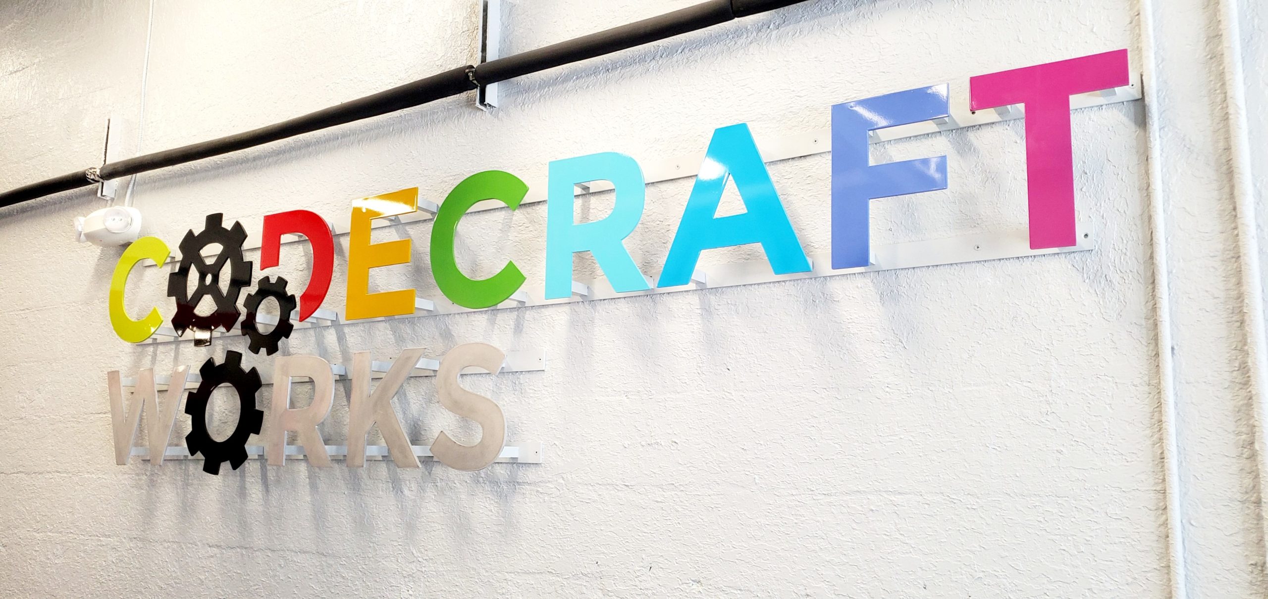 Codecraft Works sign mounted on wall