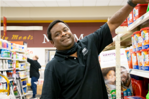 BAC Employee Stocking Shelves