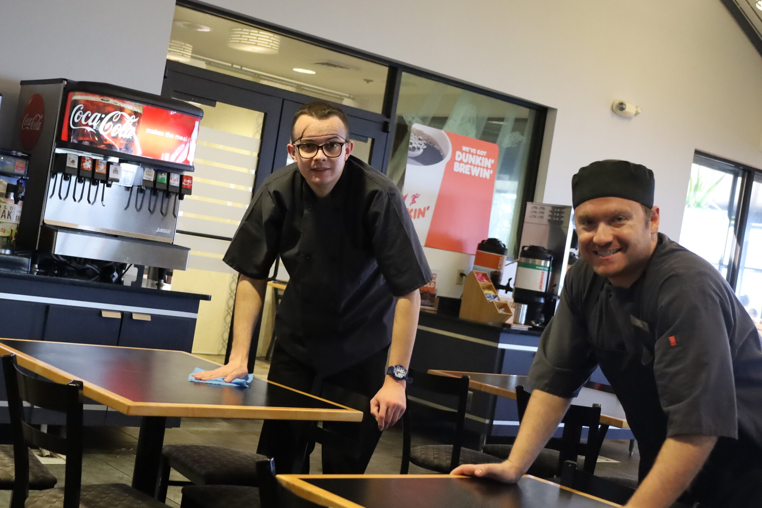 Nik C and Jack G wiping tables at PSFB Riverside Dining Hall