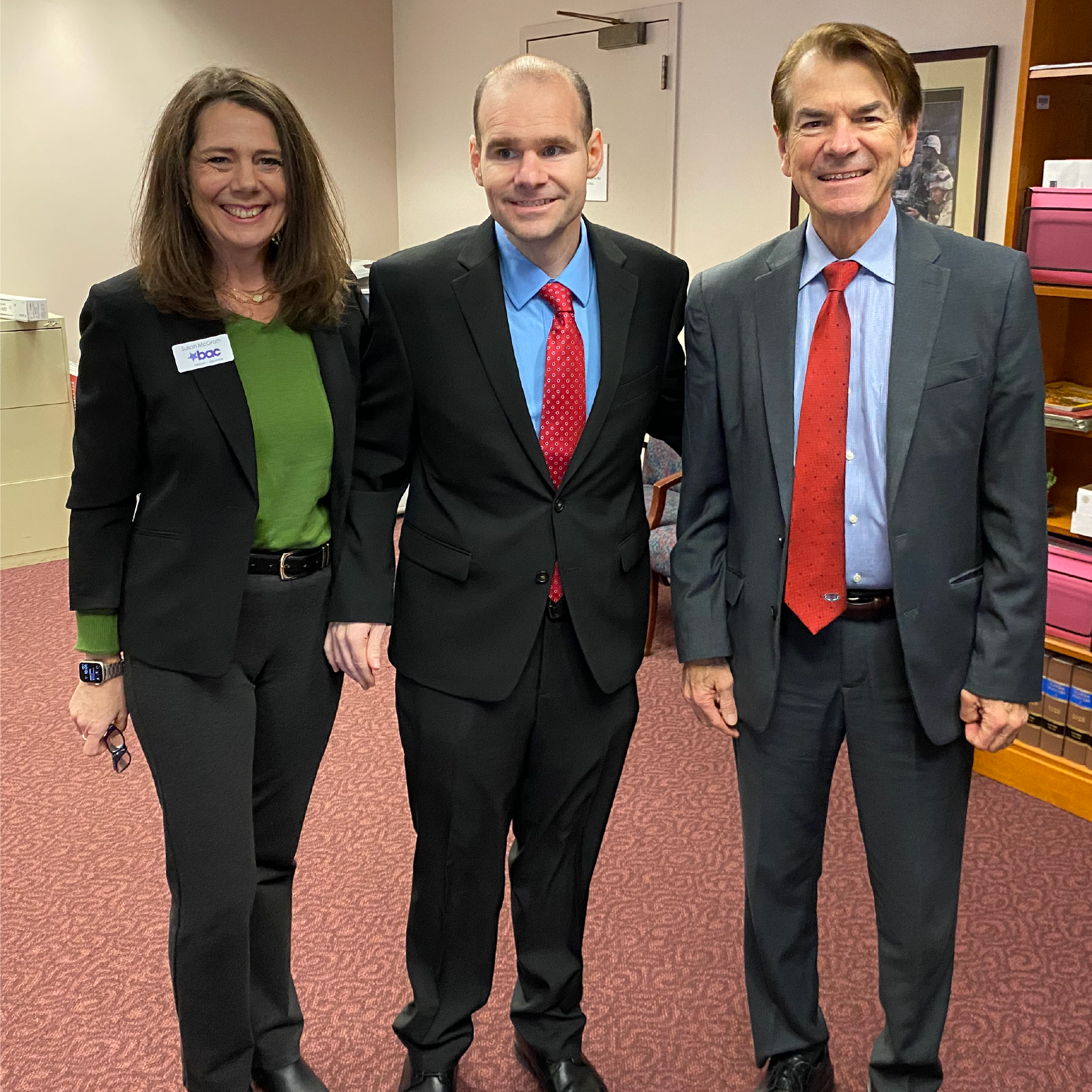 Susan McGrath, Shane, and Representative Thad Altman.