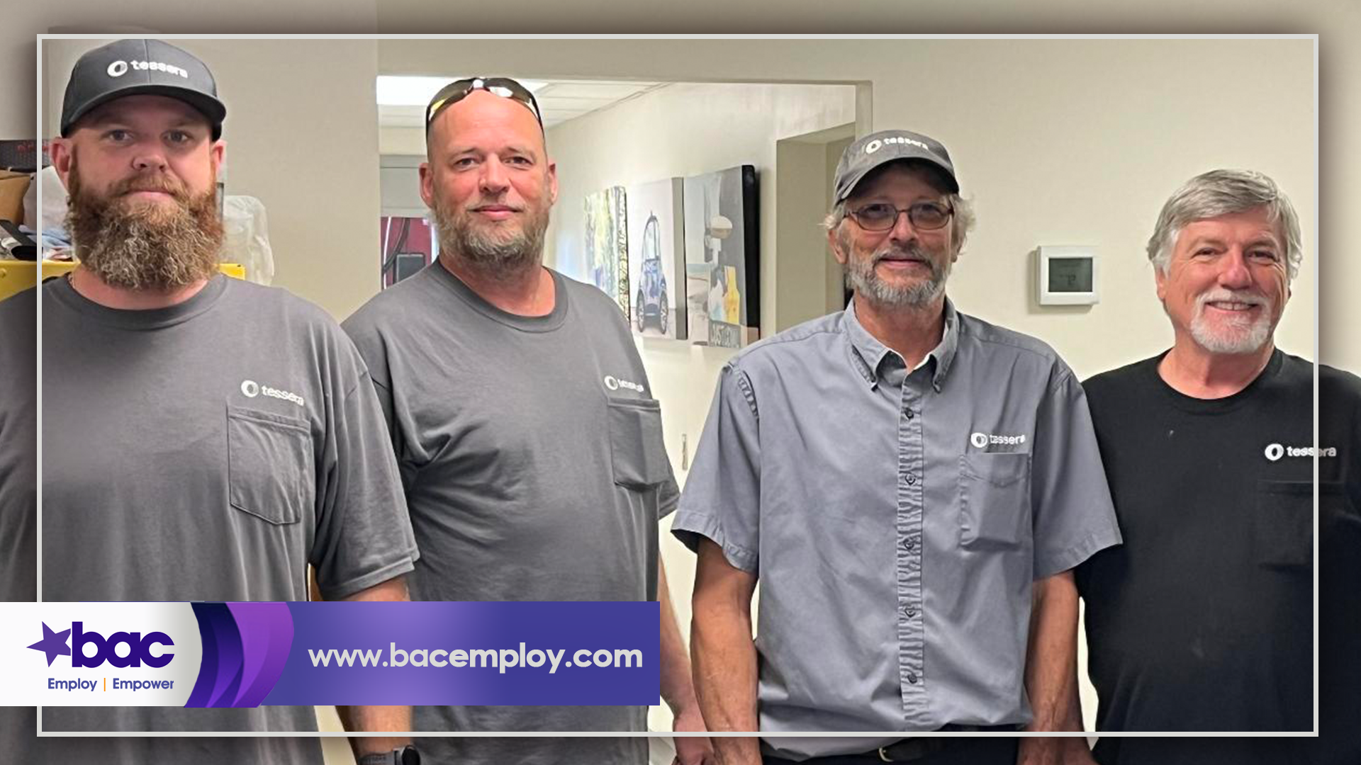 Four male employees working in partnership with BACE and Tessera at US Coast Guard Training Center Yorktown