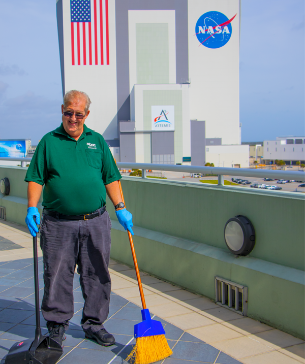 Male Cleaning Launch Viewing Platform at KSC